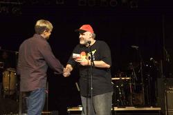 Dr. Jim receives the “Best Album” Award from Brian Whitney, founder and chairman of the JPF Independent Music Awards